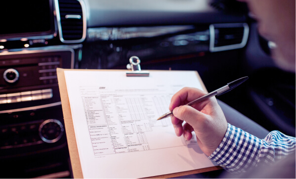 Driving test papers being marked